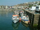 Fishing boats in Porthleven inner harbour. 29 May 2003.